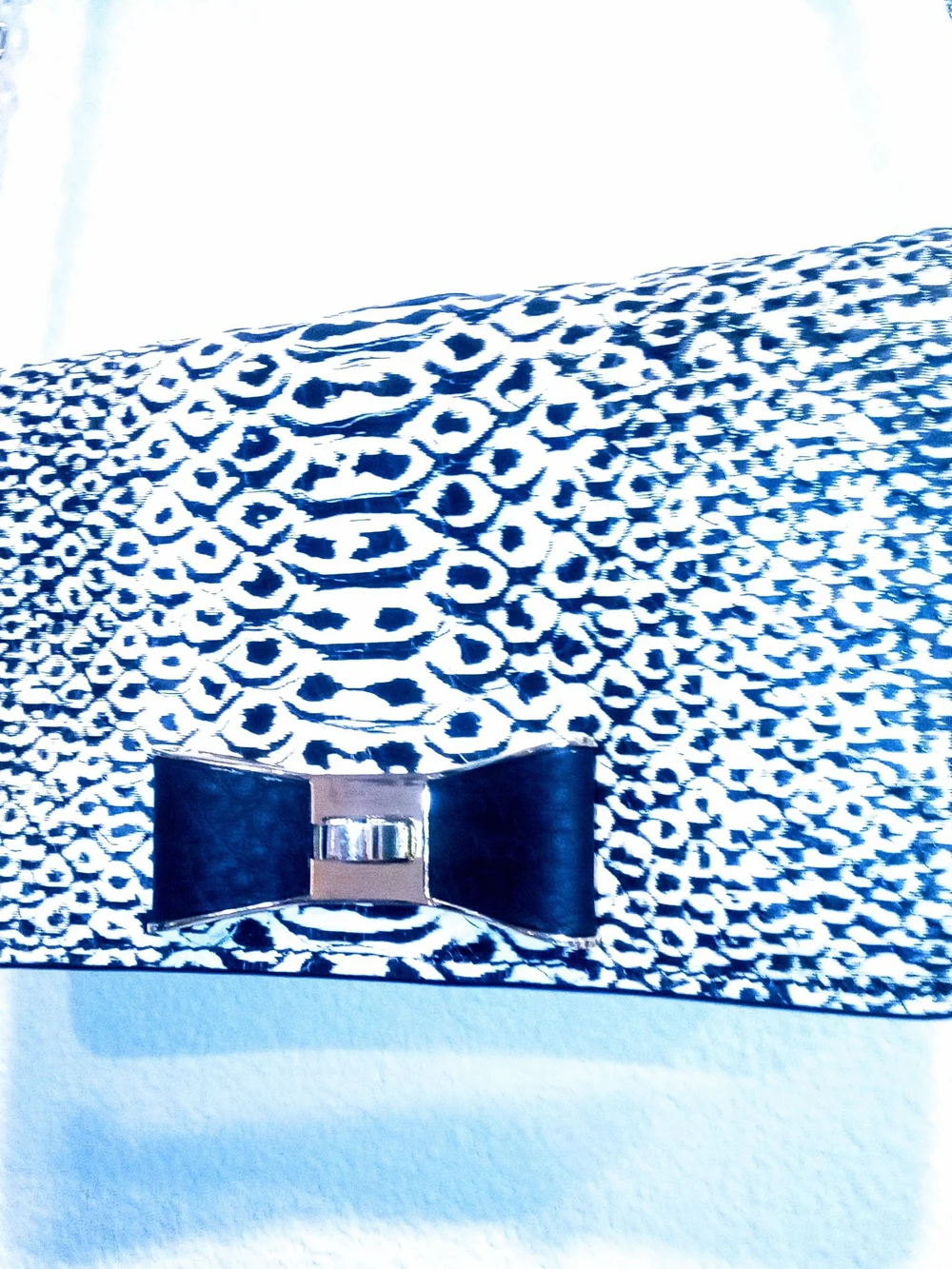 kate spade Black and White Printed Bow Clutch